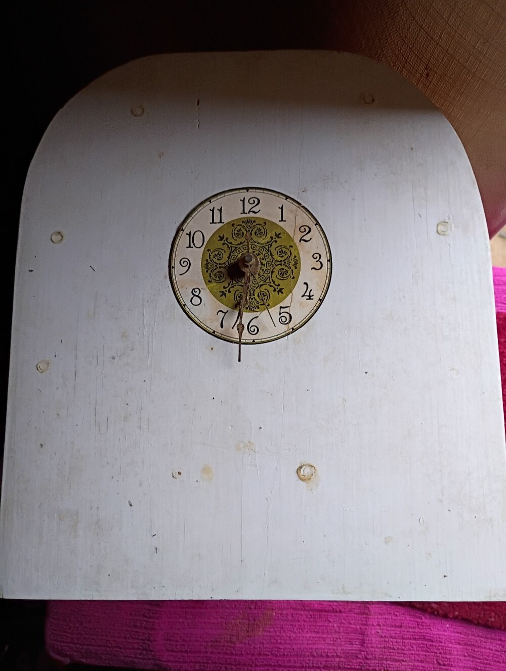 White Wall Clock with Decorative Yellow Center and Classic Numerals